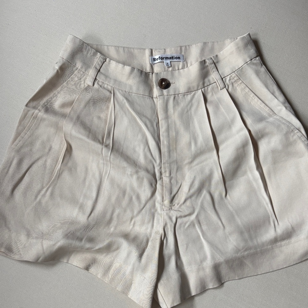Reformation High-Waist Pleated Shorts in Cream